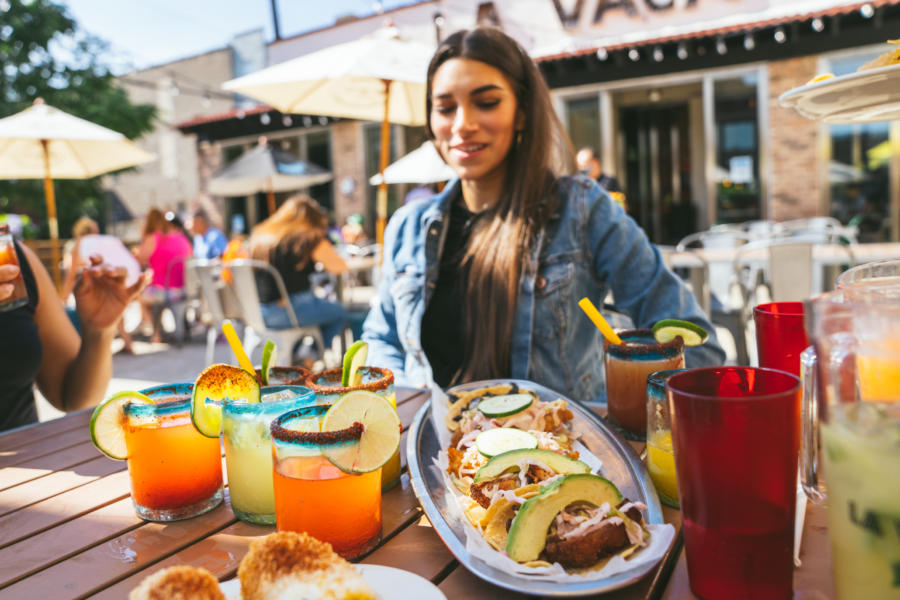 Friends drink margaritas at La Vaca in Pilsen