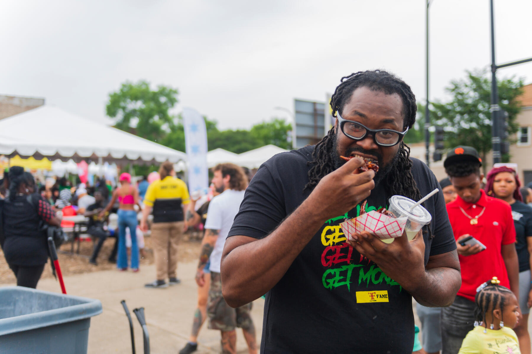 A man samples food at Taste of Chicago