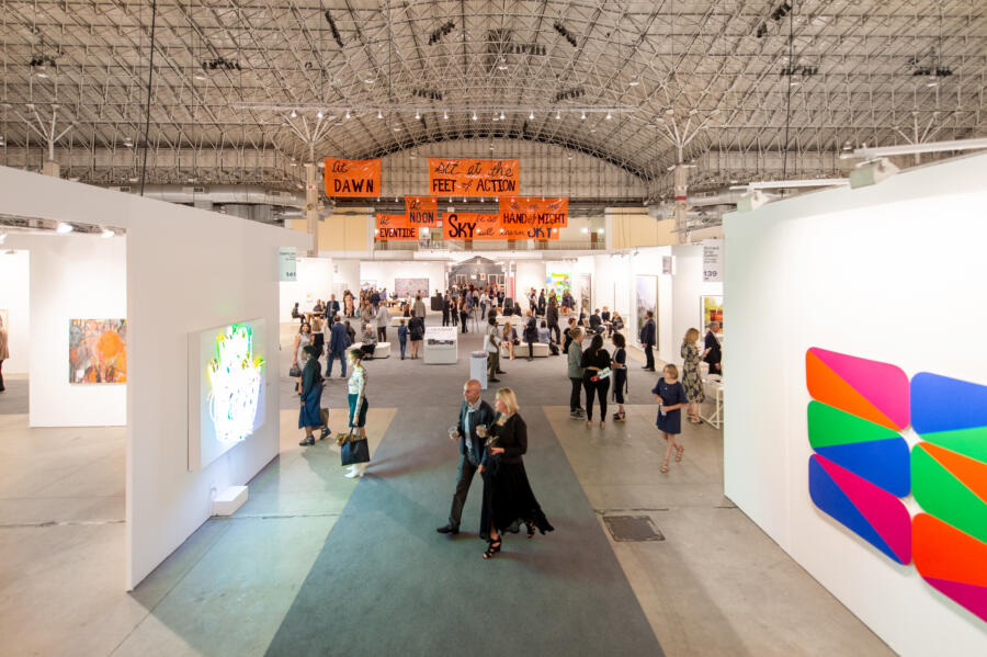 Visitors explore an exhibit at EXPO CHICAGO